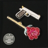 broche brodée main Macon & Lesquoy boite panoplie gun et rose